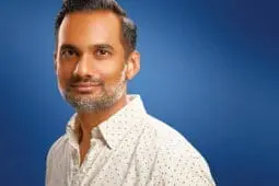 Headshot of a man looking at the camera