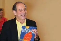 Rich holding an old issue of the magazine