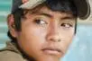 A young boy looking into the distance
