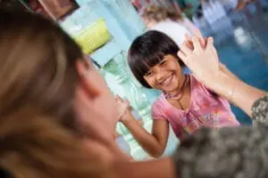 A woman and girl playing