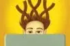 A person behind a computer screen with their hair in the shape of three "Xs"