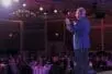A man stands on stage