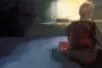 A painting of a person sitting on a bed