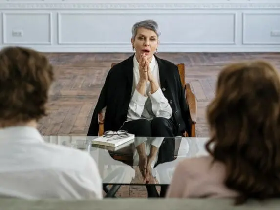 Therapist with couple client | Photo by Cotton Bro Studio/ Pexels