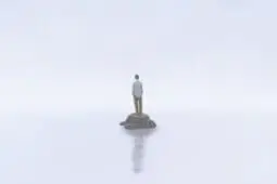 Man alone on an tiny island | ILLUSTRATION © JORM SANGSORN