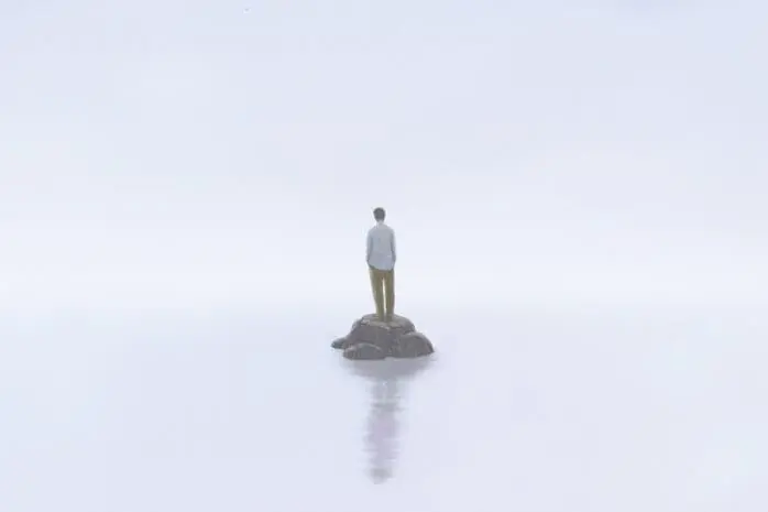 Man alone on an tiny island | ILLUSTRATION © JORM SANGSORN