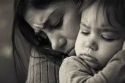 Mother and child embrace