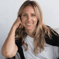 Woman with long blonde hair smiling