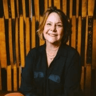 Woman in black shirt smiling