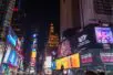 A photo of the billboards and buildings of Times Square