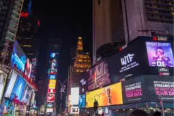A photo of the billboards and buildings of Times Square